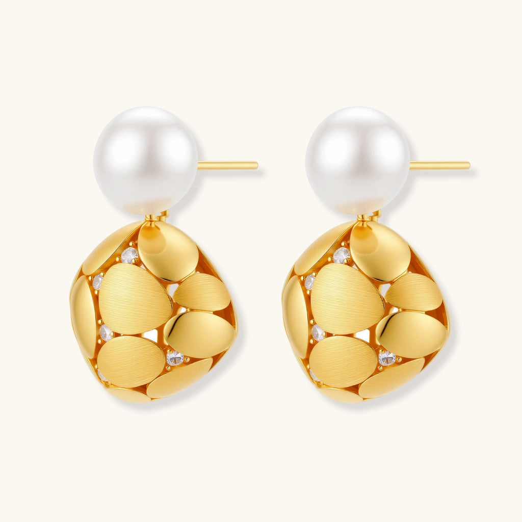 Gold-plated sterling silver drop earrings with white freshwater pearl studs and overlapping petal design with crystal accents