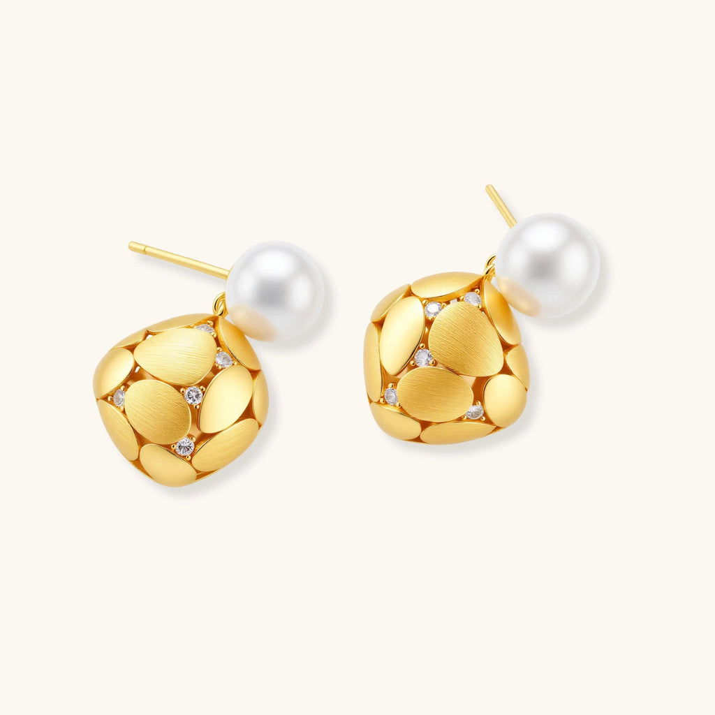 Gold-plated sterling silver drop earrings with white freshwater pearl studs and overlapping petal design with crystal accents